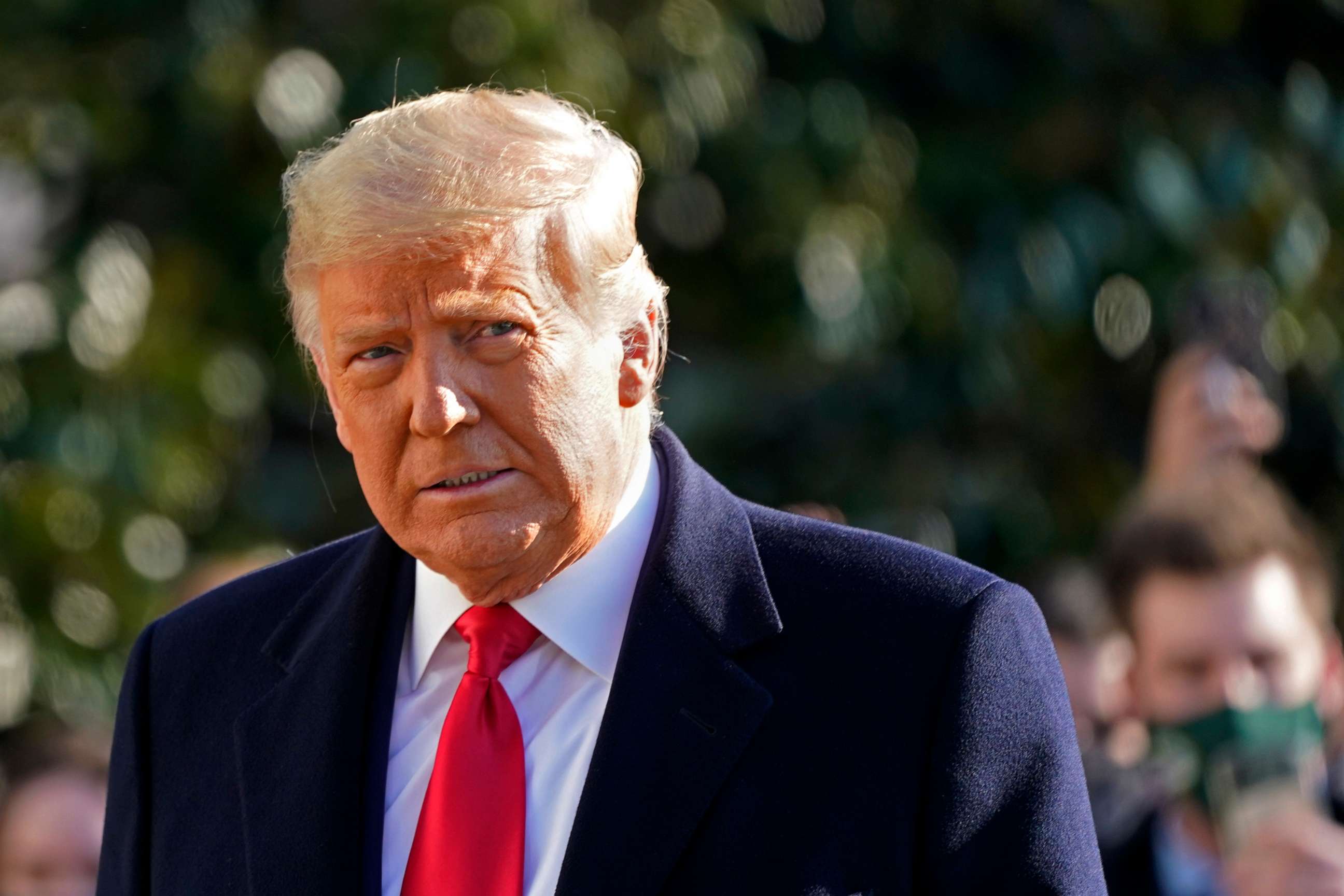 PHOTO: President Donald Trump walks to board Marine One on the South Lawn of the White House on Jan. 12, 2021, in Washington.