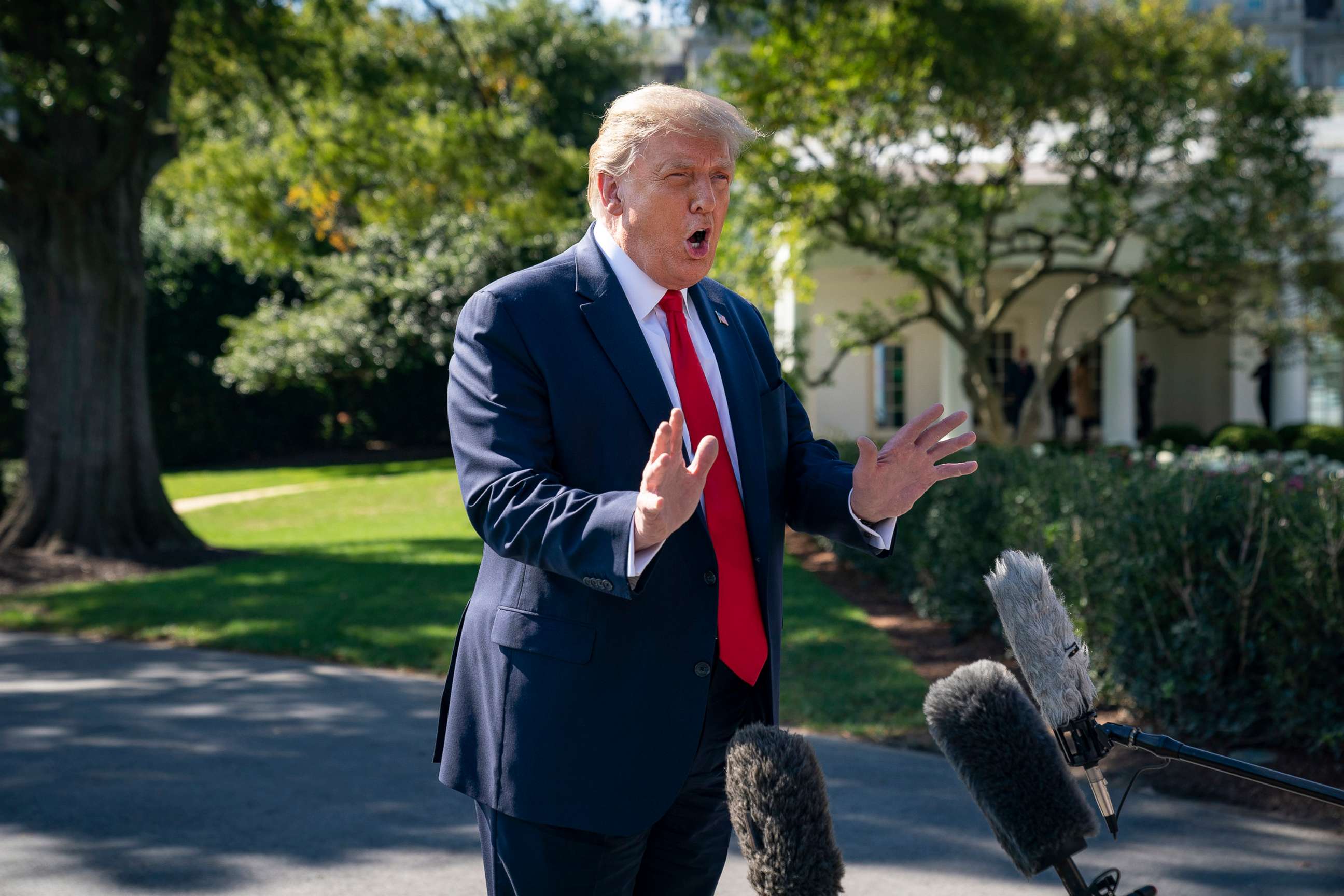 PHOTO: President Donald Trump speaks to reporters on his way to Marine One on the South Lawn of the White House in Washington, Sept. 30, 2020.