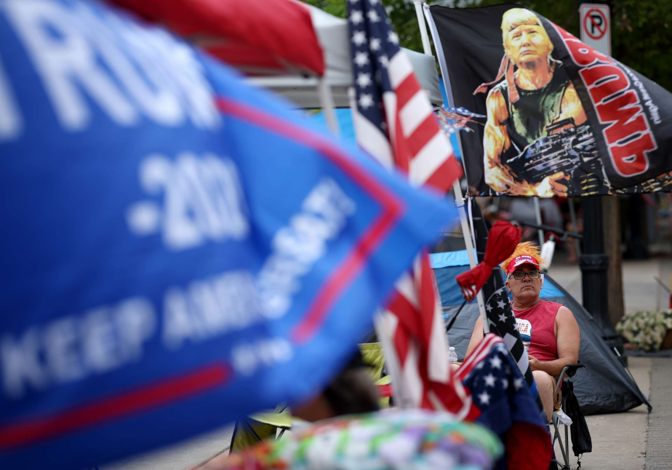 PHOTO: Supporters of President Donald Trump line up to attend the Trump's campaign rally near the BOK Center, site of tomorrow's rally, June 19, 2020, in Tulsa, Okla. 