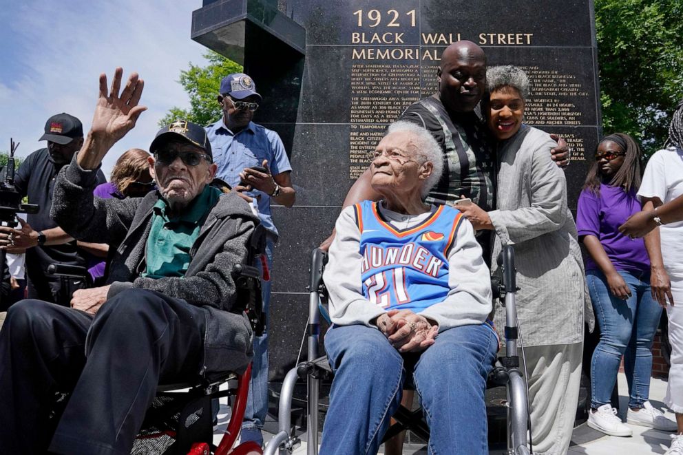 PHOTO: Tulsa race massacre survivors Hughes Van Ellis Sr. and Viola Fletcher listen during a rally marking centennial commemorations of a two-day assault by armed white men on Tulsa's prosperous Black community of Greenwood, in Tulsa, Okla. May 28, 2021.