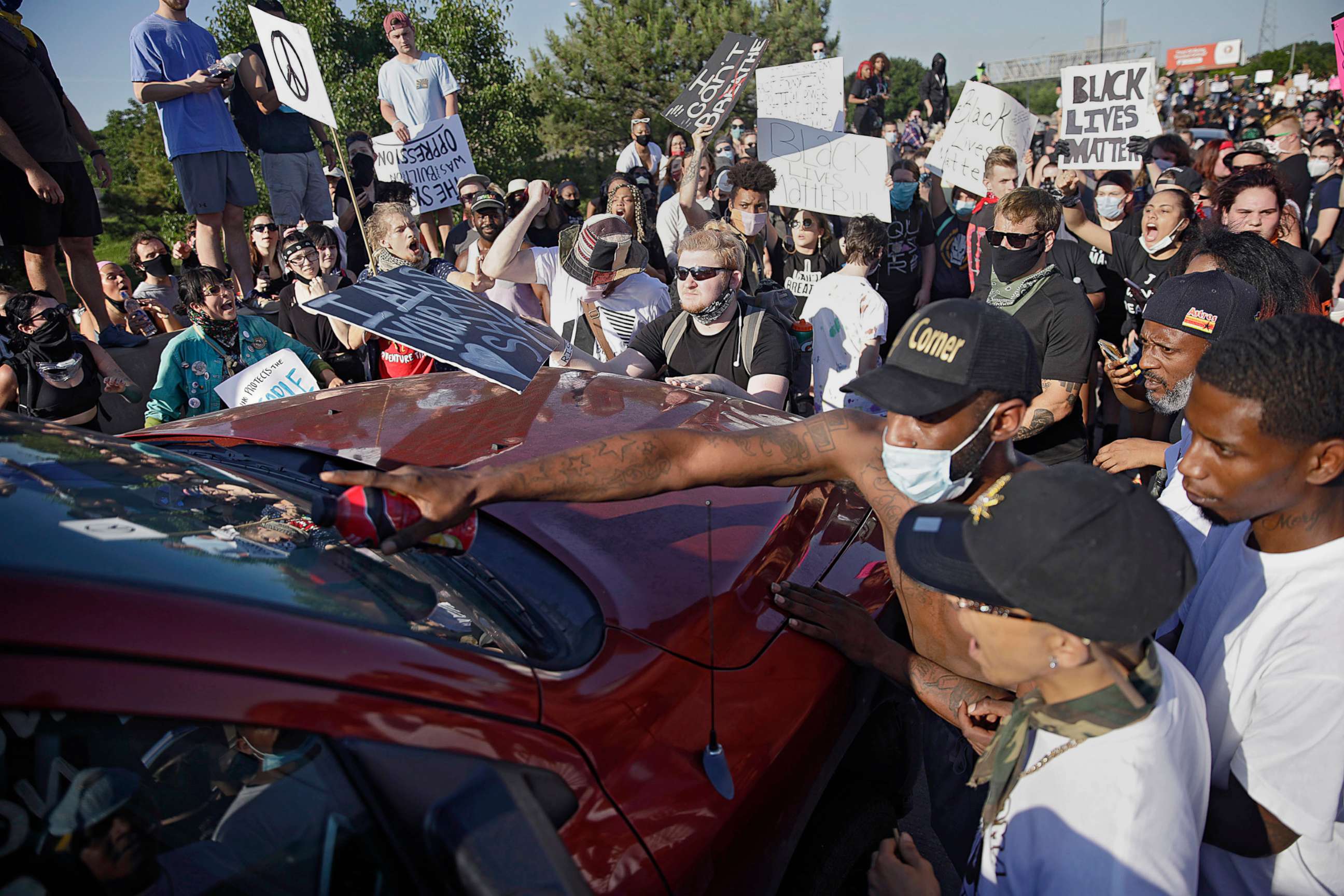 PHOTO: Protesters surround a truck shortly before it drove through the group injuring several on Interstate 244 in Tulsa, Okla., May 31, 2020.