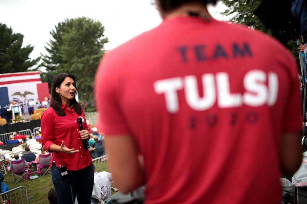 PHOTO: Democratic presidential candidate and Hawaii congresswoman Tulsi Gabbard is interviewed at the Polk County Democrats' Steak Fry on Sept. 21, 2019 in Des Moines, Iowa.