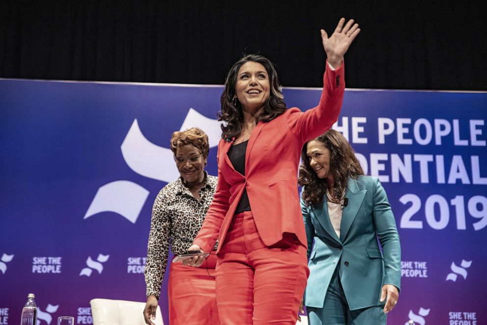 PHOTO: Democratic presidential candidate Rep. Tulsi Gabbard (D-HI) waves to a crowd at the "She The People Presidential Forum," April 24, 2019, in Houston, Texas.