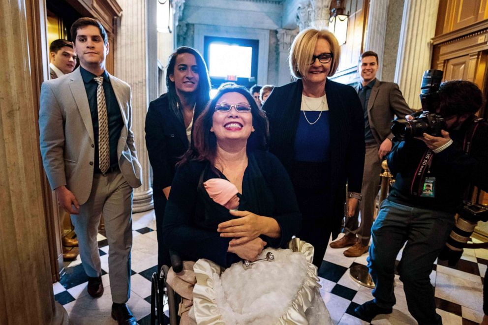 PHOTO: Sen. Tammy Duckworth carries her 10-day old daughter Maile Pearl Bowlsbey onto the Senate floor for a vote, at the U.S. Capitol in Washington, April 19, 2018.