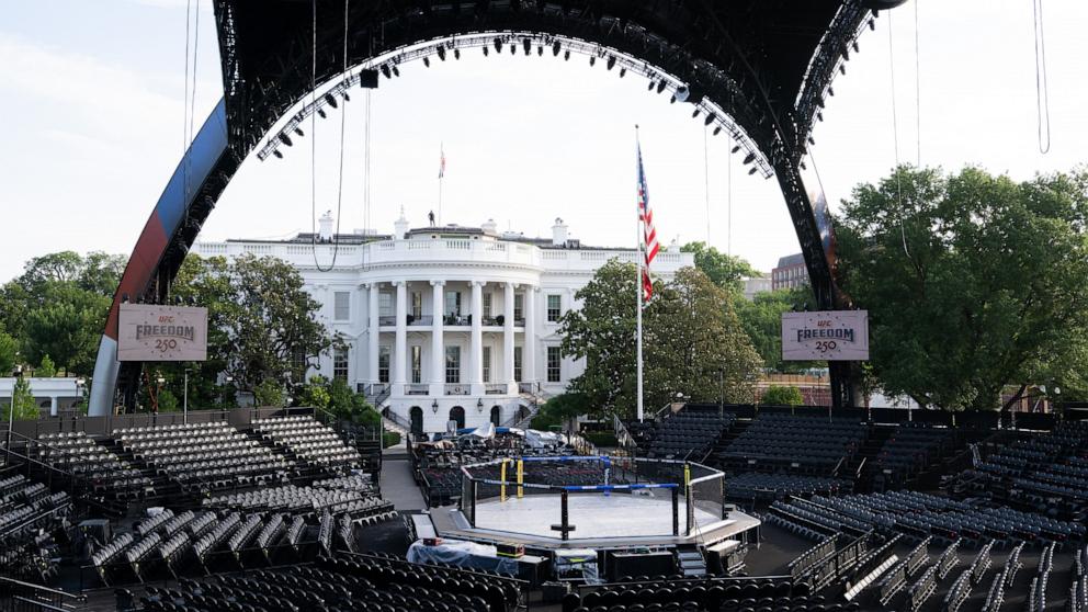 PHOTO: The structure, known as "The Claw," for the upcoming UFC fight that President Donald Trump will host as part of the 250th anniversary of the United States, is seen on the South Lawn of the White House during a media preview, June 11, 2026. 