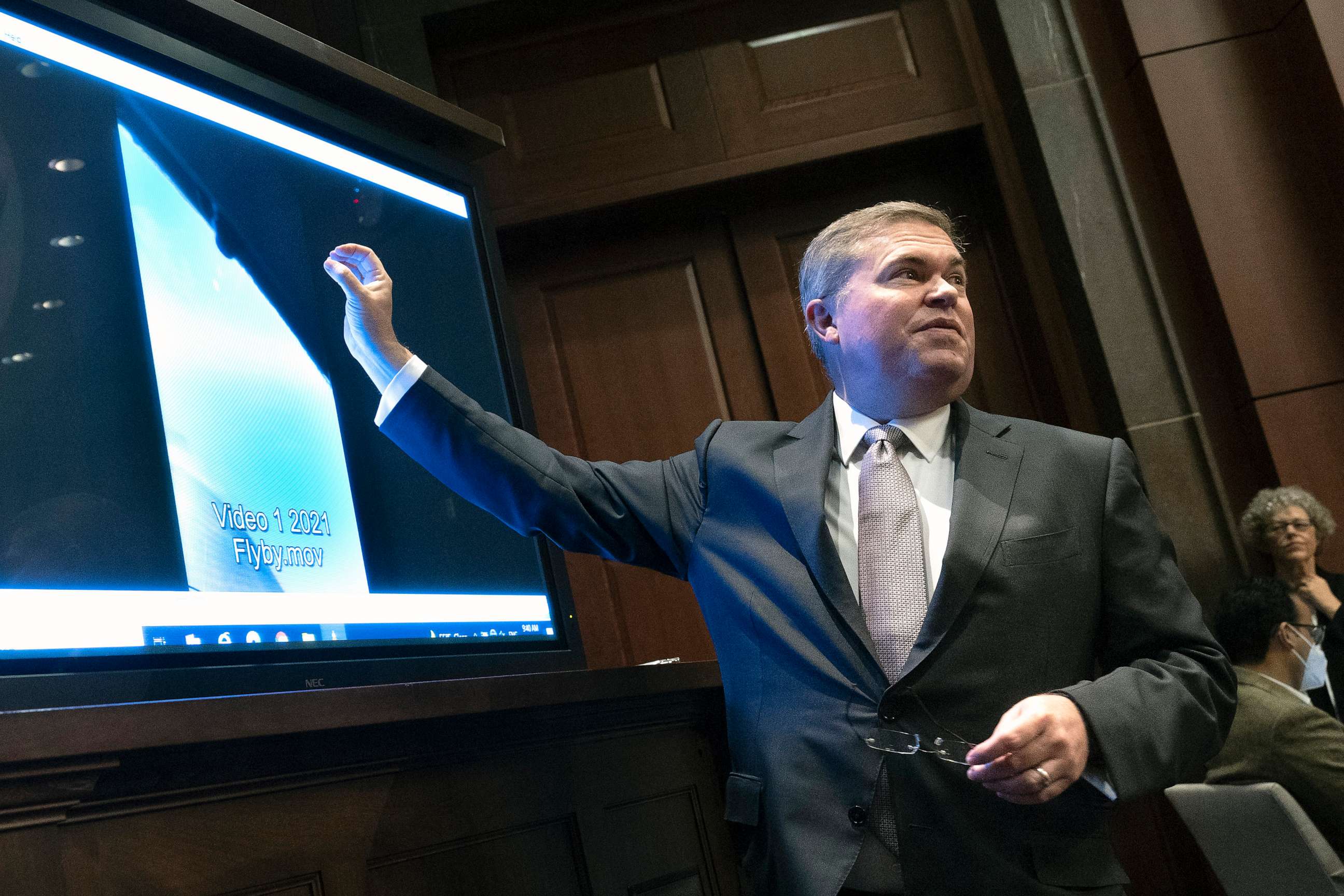 PHOTO: Deputy Director of Naval Intelligence Scott Bray explains a video of an unidentified aerial phenomena, as he testifies before a House Intelligence Committee subcommittee hearing at the U.S. Capitol on May 17, 2022 in Washington, DC.
