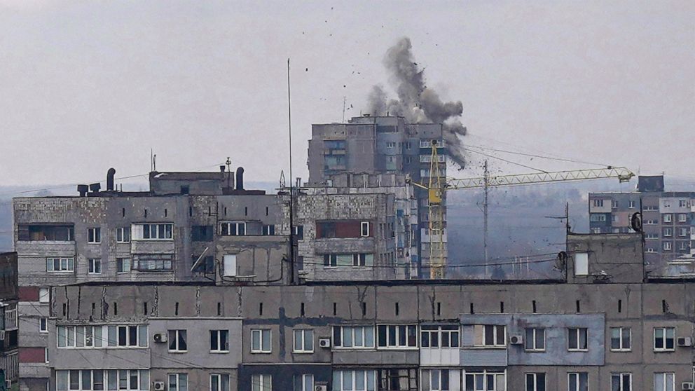 PHOTO: Explosions are seen during shelling in a residential district in Mariupol, Ukraine, March 10, 2022. 
