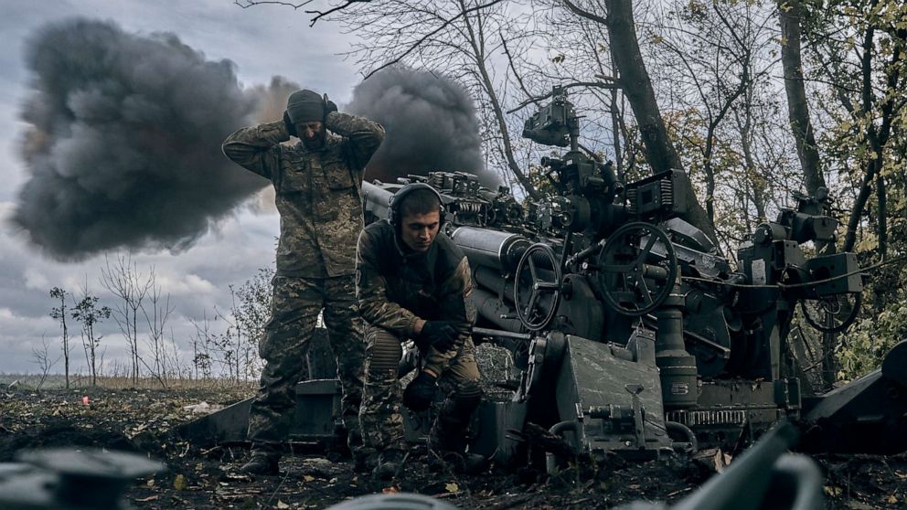 PHOTO: Ukrainian soldiers fire at Russian positions from a U.S.-supplied M777 howitzer in Ukraine's eastern Donetsk region, Oct. 23, 2022.