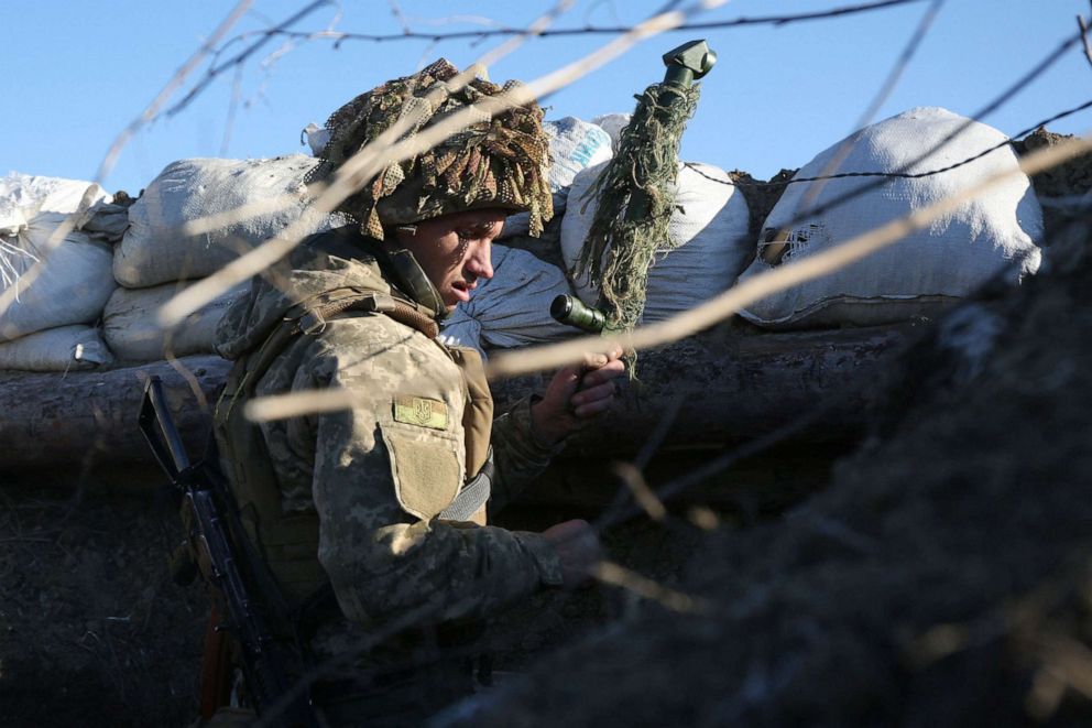 PHOTO: Ukrainian Territorial Defense Forces, the military reserve of the Ukrainian Armes Forces secures on a trench on the frontline with Russia-backed separatists near to Avdiivka, southeastern Ukraine, Jan. 8, 2022.