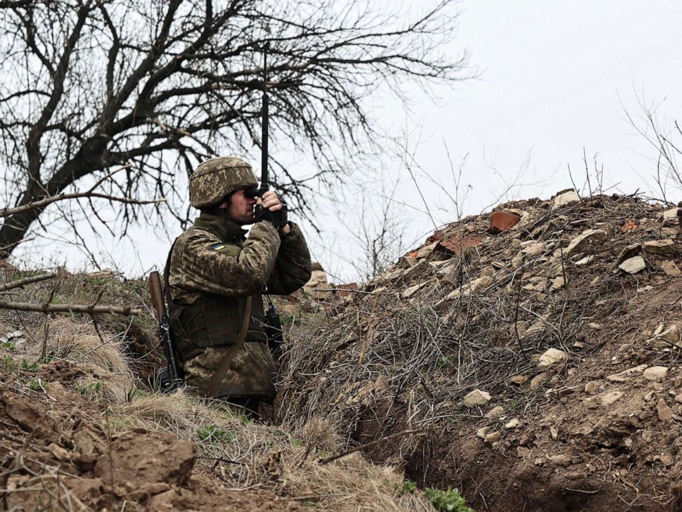 PHOTO: A Ukrainian soldier stands guard on the line of separation from pro-Russian rebels near Donetsk, Ukraine, April 12, 2021.