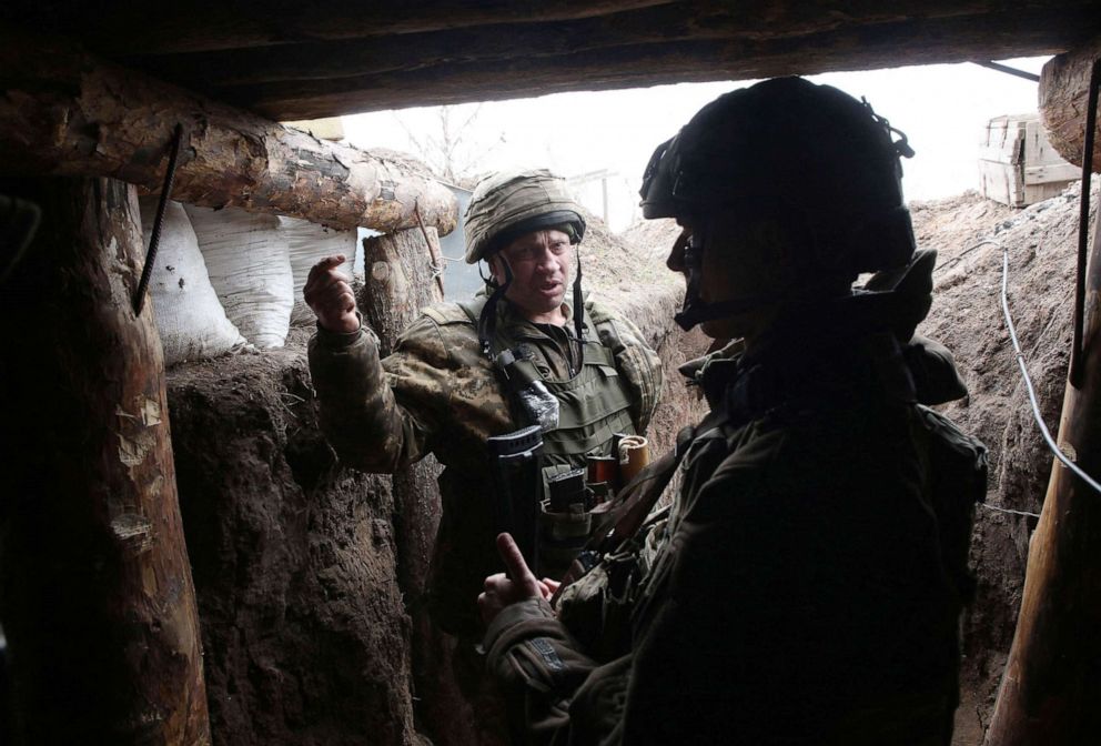 PHOTO: Ukrainian servicemen hold a position on the frontline with Russia backed separatists near small city of Marinka, Donetsk region, April 12, 2021.