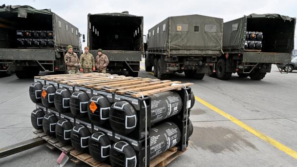 Ukrainian servicemen are at work to receive the delivery of FGM-148 Javelins, American man-portable anti-tank missile provided by US to Ukraine as part of a military support, at Kyiv's airport Boryspil, Feb. 11, 2022, amid the crisis linked with the threat of Russia's invasion. 