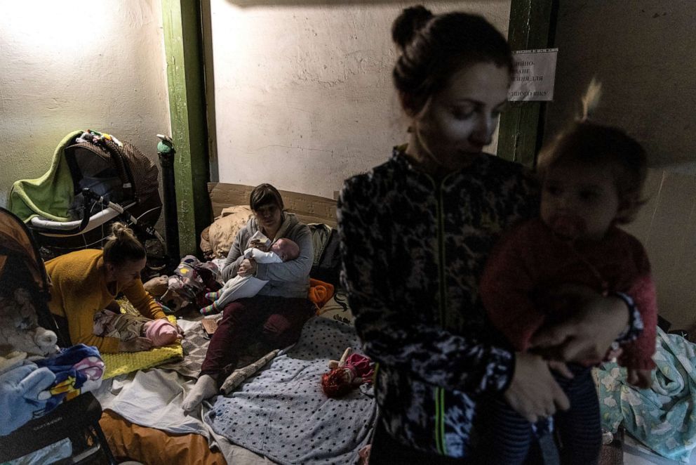 PHOTO: Mothers tend to their babies that are receiving medical treatment in the bomb shelter of the paediatric ward of a hospital in Kyiv, Ukraine, on Feb. 28, 2022.