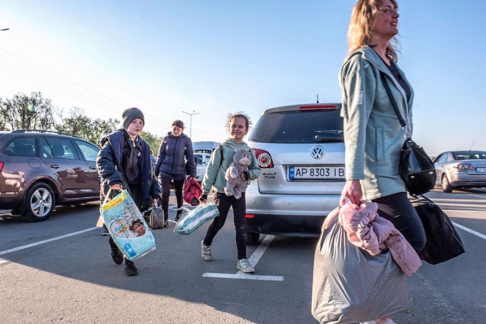 PHOTO: A family from Mariupol arrives at a center for displaced people in Zaporizhia, Ukraine, May 8, 2022.