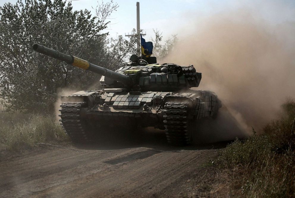 PHOTO: A Ukrainian tank rolls down a road at a position along the front line in the Donetsk region on August 15, 2022, amid Russia's invasion of Ukraine.