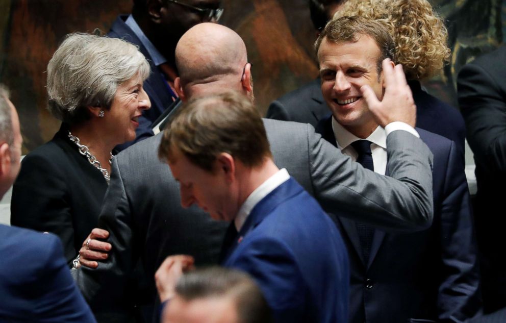 PHOTO: Britain's Prime Minister Teresa May, left, and Belgium's Prime Minister Charles Michel, center, greet France's President Emmanuel Macron, right, at the start of the United Nations Security Council meeting in New York, Sept. 26, 2018.