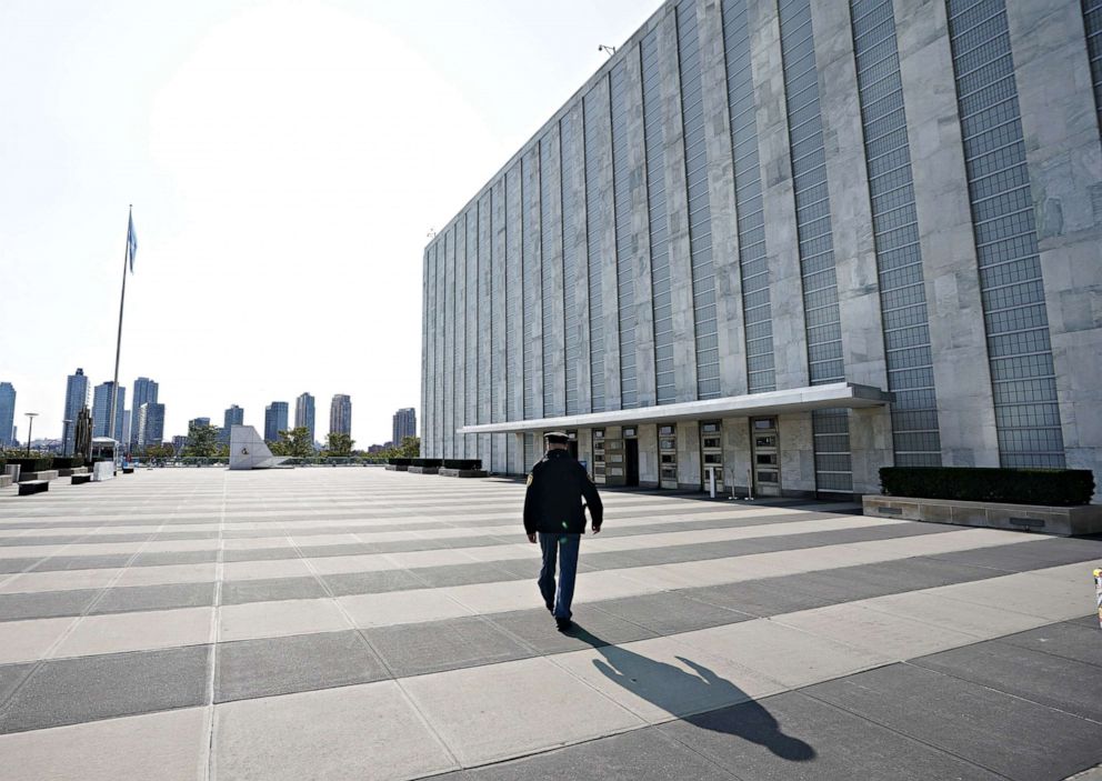 PHOTO: A security guard walks around empty grounds at the United Nations, Sept. 22, 2020, during the the 75th General Assembly which will be mostly virtual due to the COVID-19 pandemic in New York.
