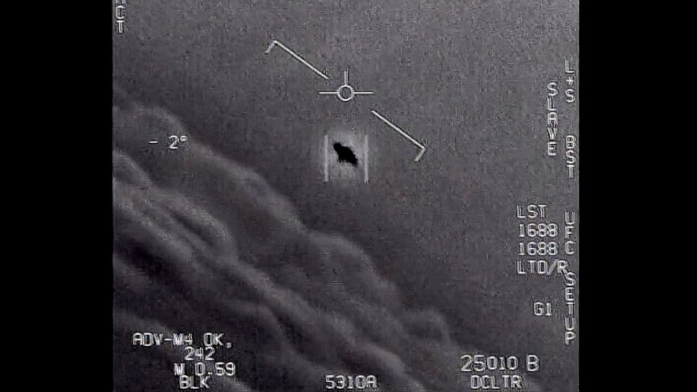 PHOTO: The image from video provided by the Department of Defense labelled Gimbal, from 2015, an unexplained object is seen at center as it is tracked as it soars high along the clouds, traveling against the wind.