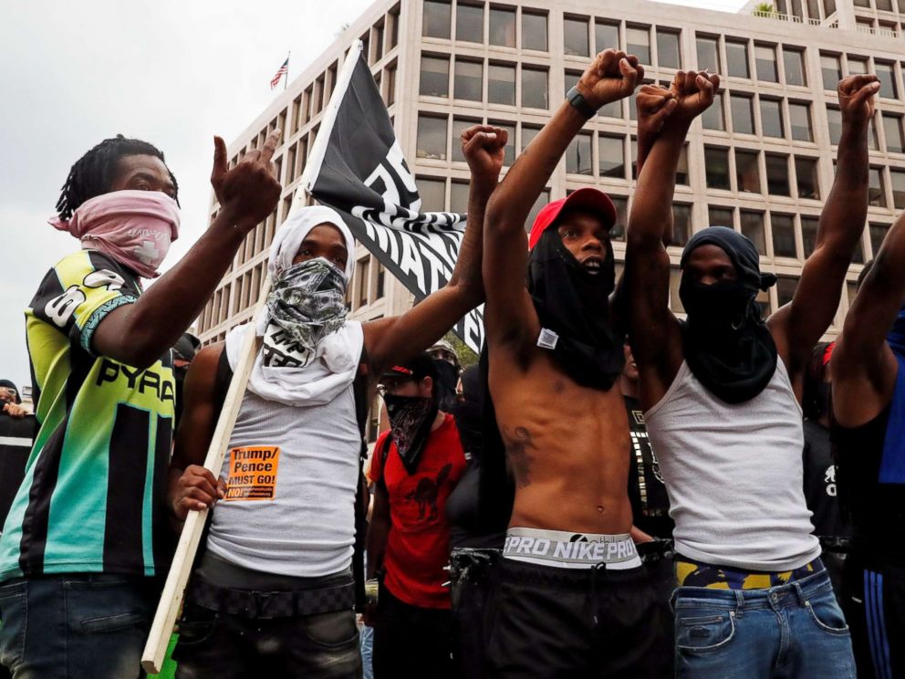 PHOTO: Counter-protesters of the "Unite the Right" rally, shout slogans in downtown Washington, D.C., Aug. 12, 2018.