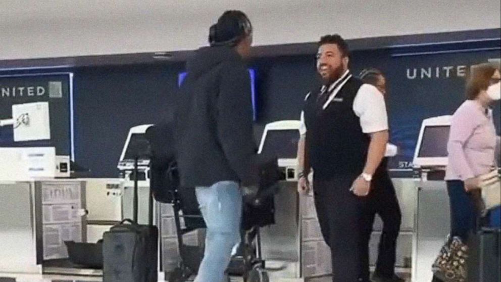 PHOTO: An altercation between a United ticket agent employee and Brendan Langley, at Newark Airport on Thursday, May 19, 2022, is pictured in an image from video made by a bystander. According to United, the employee has been fired upon  reviewing video.
