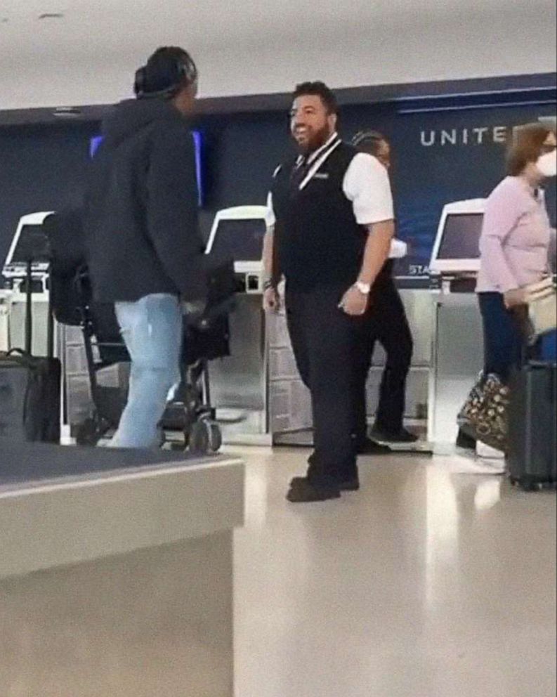 PHOTO: An altercation between a United ticket agent employee and Brendan Langley, at Newark Airport on Thursday, May 19, 2022, is pictured in an image from video made by a bystander. According to United, the employee has been fired upon  reviewing video.