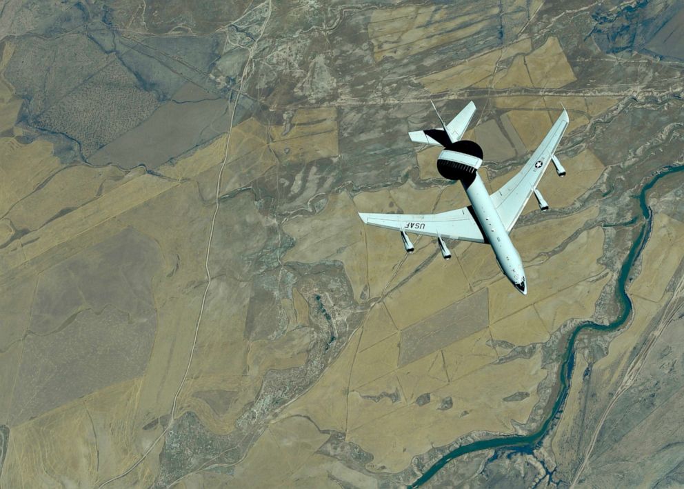 PHOTO: A U.S. Air Force E-3 Sentry (AWACS) descends after receiving fuel from a KC-10 Extender, assigned to the 908th Expeditionary Air Refueling Squadron, out of Al Dhafra Air Base, United Arab Emirates, Sept. 1, 2019.