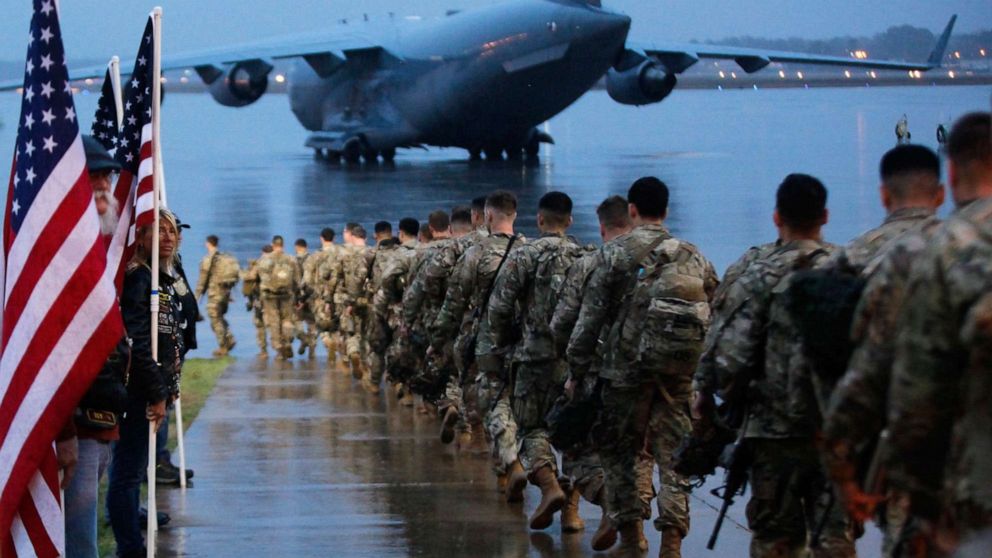 PHOTO: U.S. Army's 82nd Airborne paratroopers march to board a civilian aircraft bound for the U.S. Central Command area of operations from Fort Bragg, N.C., Jan. 4, 2020.