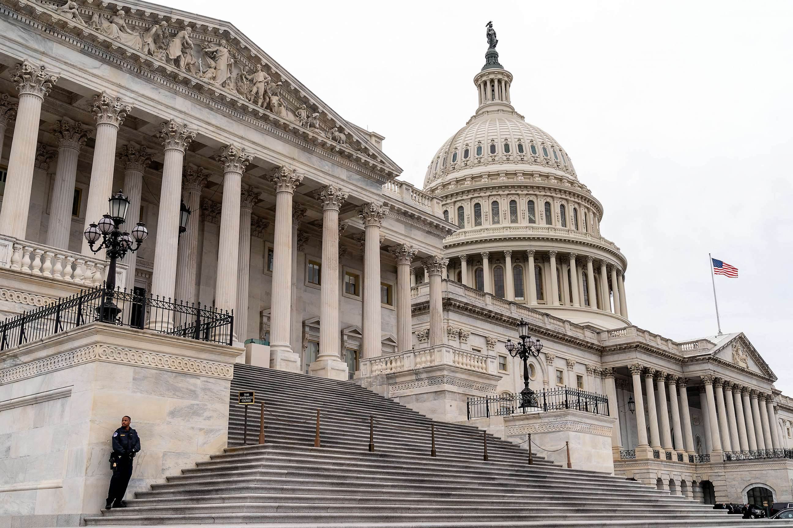 PHOTO: FILE - A US Capitol Police officer stands at the steps to the House of Representative outside the US Capitol in Washington, DC, Jan. 4, 2023.