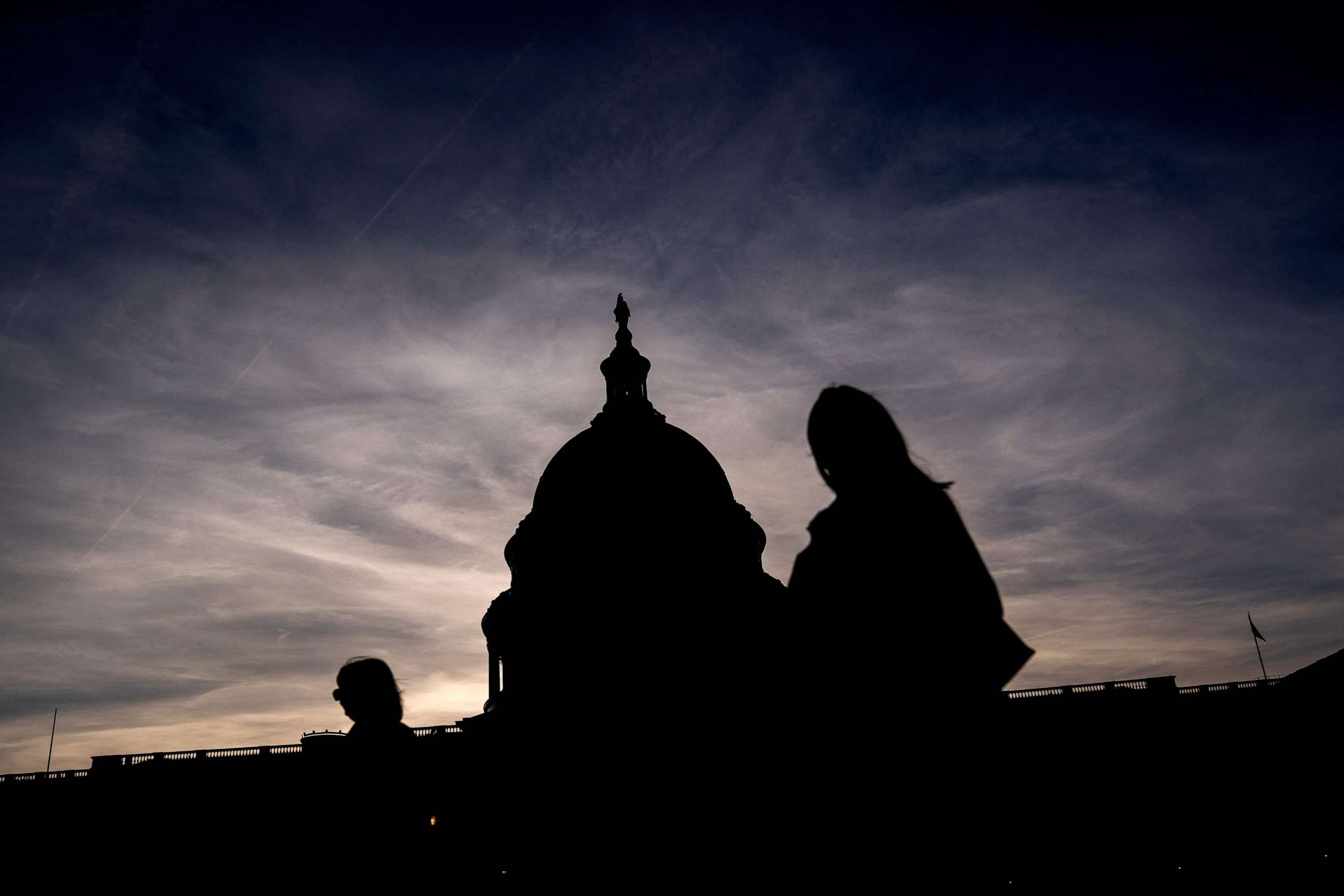 PHOTO: Visitors walk past the US Capitol in Washington, DC, on March 14, 2022.