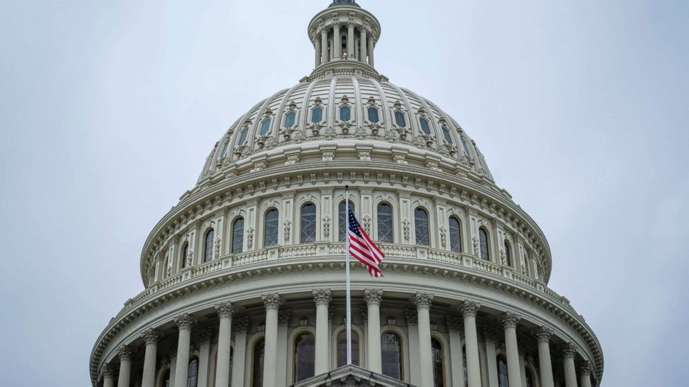 PHOTO: An American flag flies in front of the dome of the U.S. Capitol in Washington, April 9, 2018.