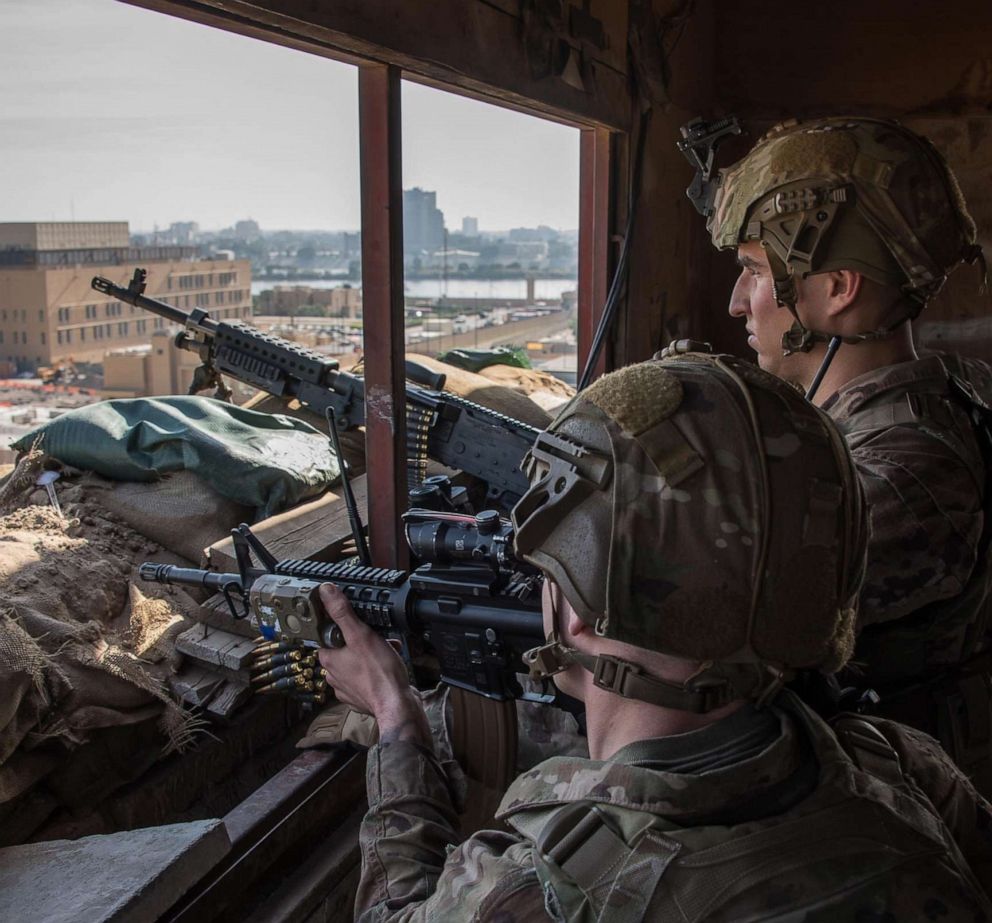 PHOTO: U.S. Army Soldiers maintain overwatch at the U.S. Embassy Compound in Baghdad, Iraq, Jan. 1, 2020.