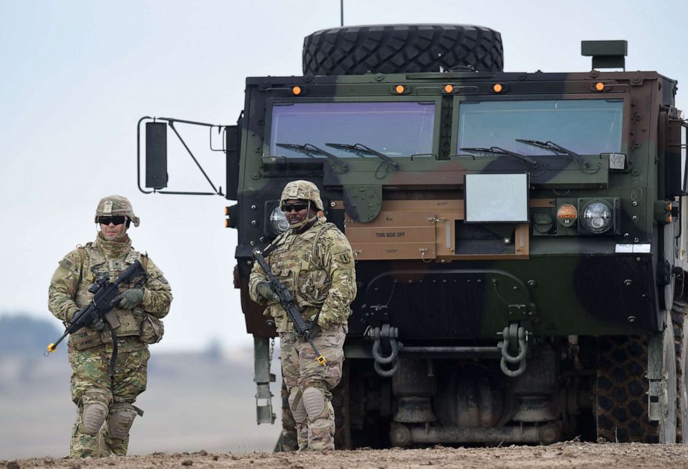 PHOTO: In this March 4, 2020, file photo, U.S. soldiers patrol prior to an artillery live fire event by the US Army Europe's 41st Field Artillery Brigade at the military training area in Grafenwoehr, southern Germany.