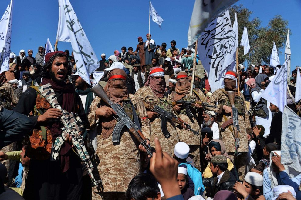 PHOTO: Taliban militants and villagers attend a gathering as they celebrate the peace deal and their victory in the Afghan conflict, Laghman, Afghanistan, March 2, 2020.