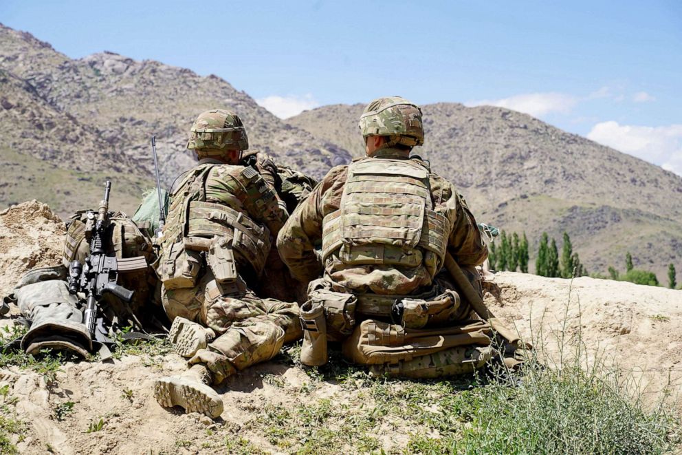 PHOTO: US soldiers look out over hillsides at the Afghan National Army checkpoint in Nerkh district of Wardak province, June 6, 2019.