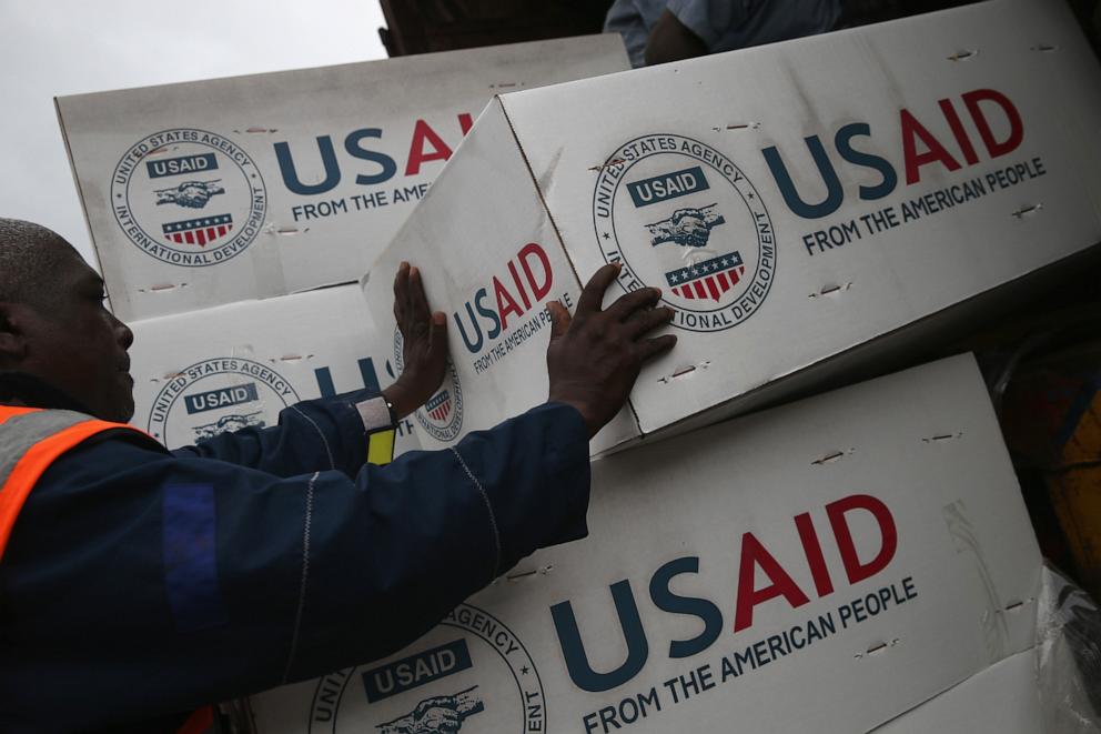 PHOTO: In an Aug. 14, 2014 file photo, workers unload medical supplies to fight the Ebola epidemic from a USAID cargo flight in Harbel, Liberia. 