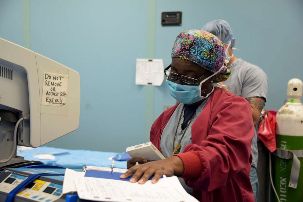 PHOTO: A US military surgical technician prepares a patient for surgery aboard the USNS Comfort in Colon, Honduras, Dec. 10, 2018. 
