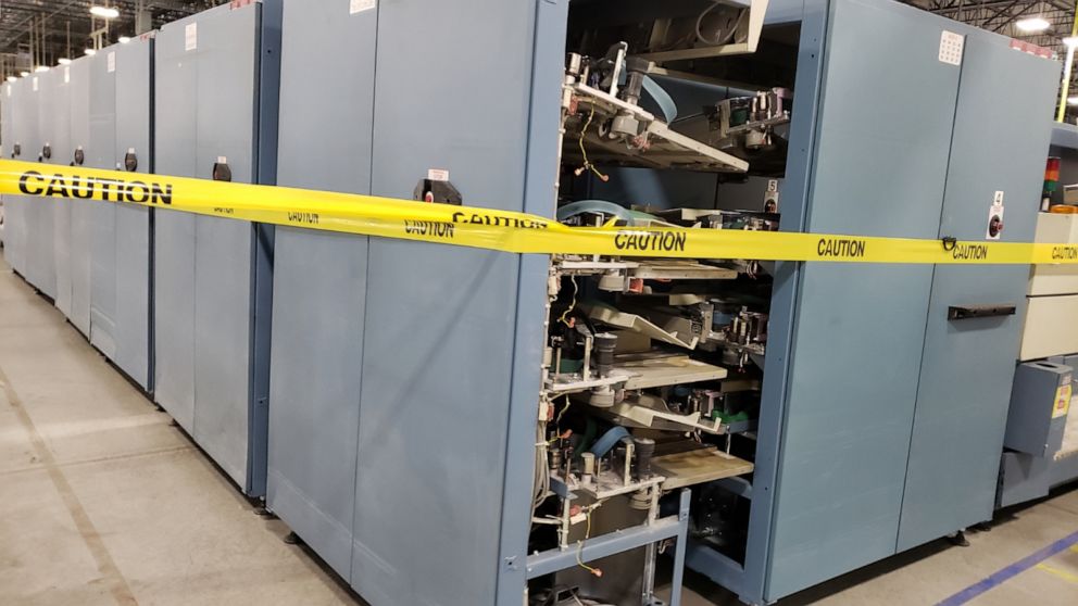 Photos appear to show mail sorting machines in parts in US postal facility thumbnail