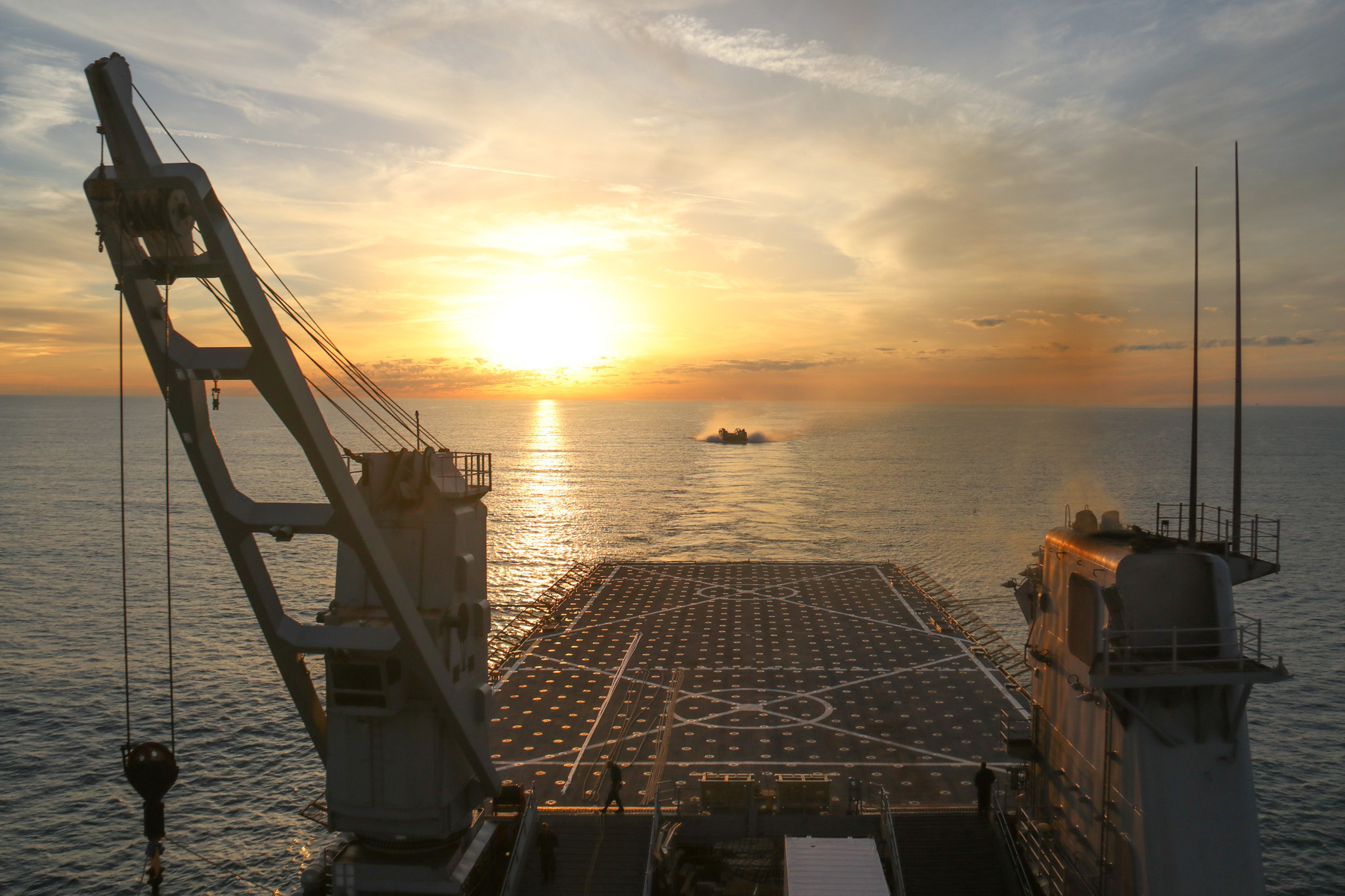 PHOTO: A landing craft air cushion (LCAC) approaches the well deck of the Harpers Ferry-Class dock landing ship USS Carter Hall, Feb. 7, 2023, in the Atlantic Ocean, during recovery efforts of the high altitude surveillance balloon brought down on Feb. 4.