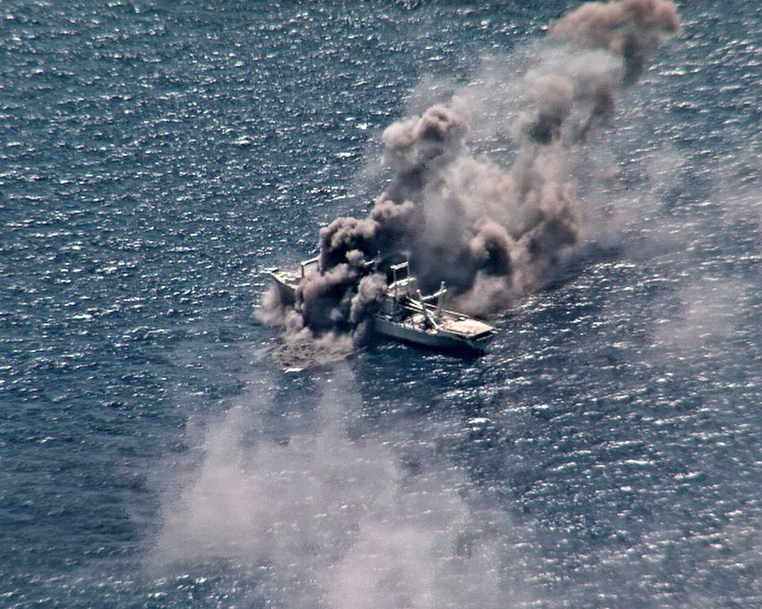 PHOTO: Live fire from ships and aircraft participating in the Rim of the Pacific exercise sink the decommissioned ex-USS Durham, Aug. 30, 2020.