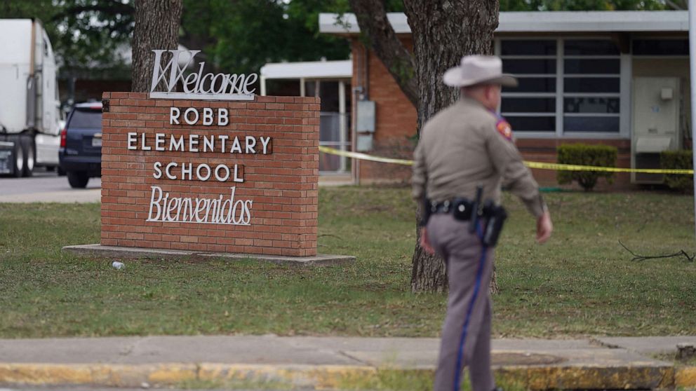 PHOTO: An officer walks outside of Robb Elementary School in Uvalde, Texas, May 24, 2022.