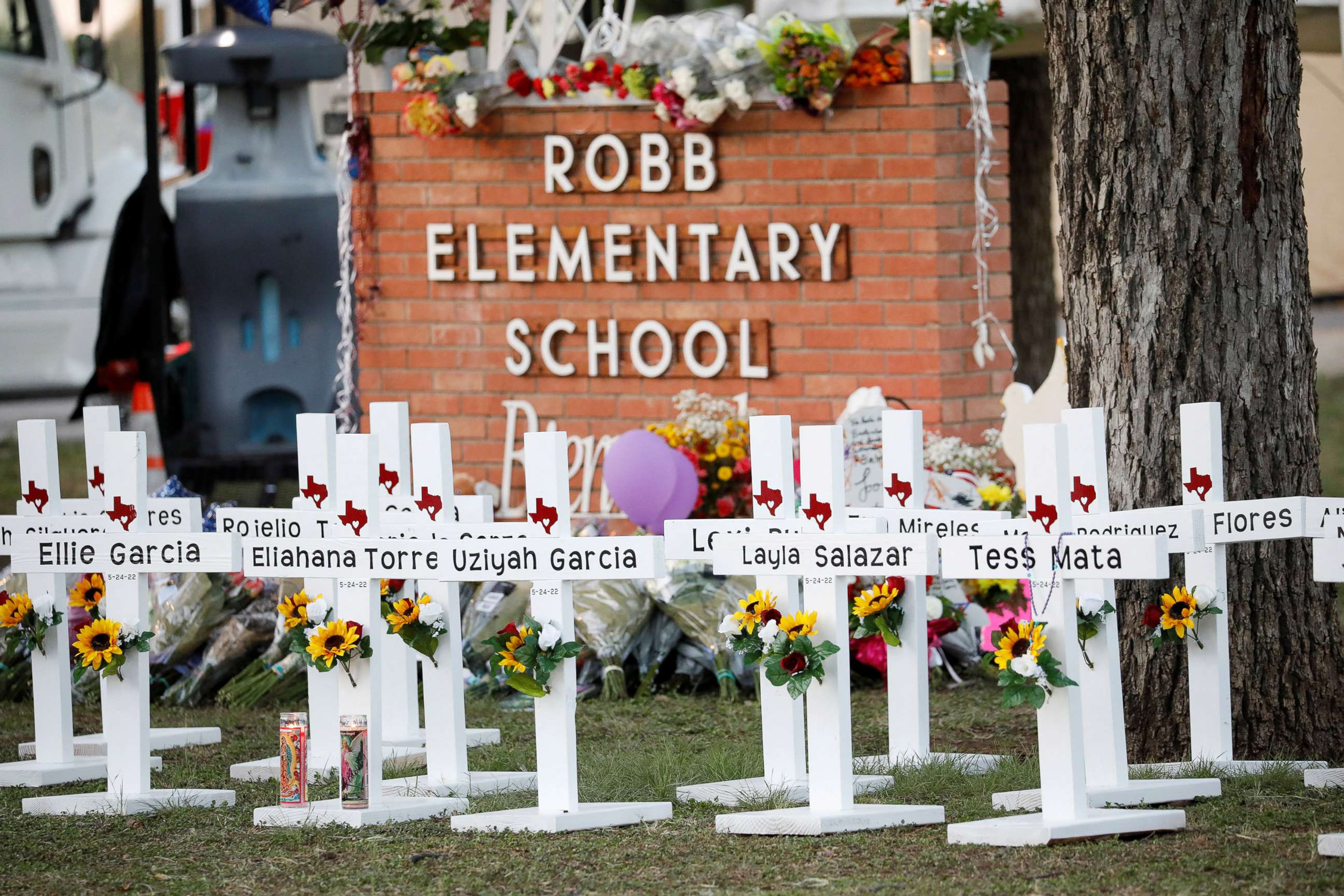 PHOTO: Crosses with the names of victims of a school shooting, are pictured at a memorial outside Robb Elementary school, after a gunman killed nineteen children and two teachers, in Uvalde, U.S. May 26, 2022. 