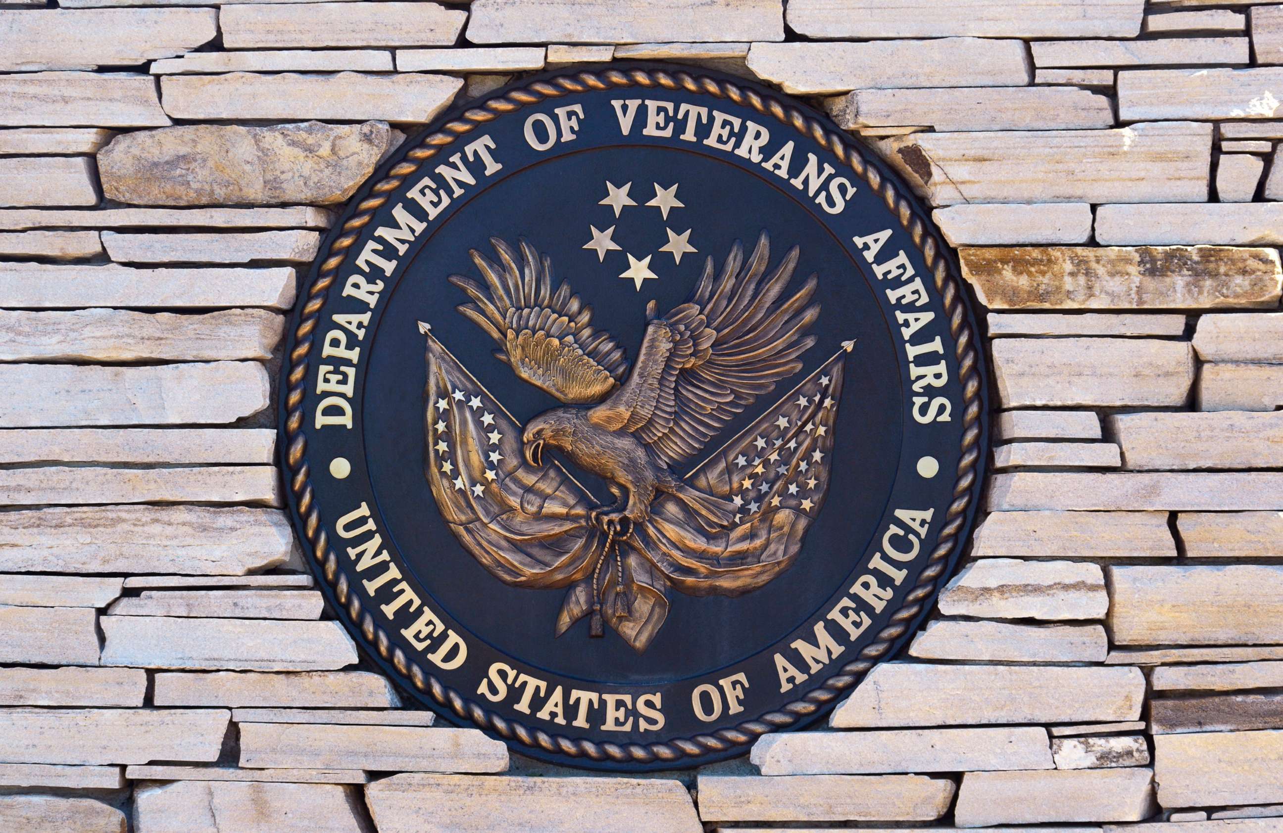 PHOTO: The seal of the United States Department of Veterans Affairs at the entrance to the Santa Fe National Cemetery in Santa Fe, May 27, 2019. 