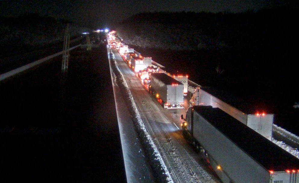PHOTO: Traffic along a closed section of Interstate 95 near Fredericksburg, Va., in the early hours of Jan. 4, 2022, after both northbound and southbound sections of the highway were closed due to snow and ice. 