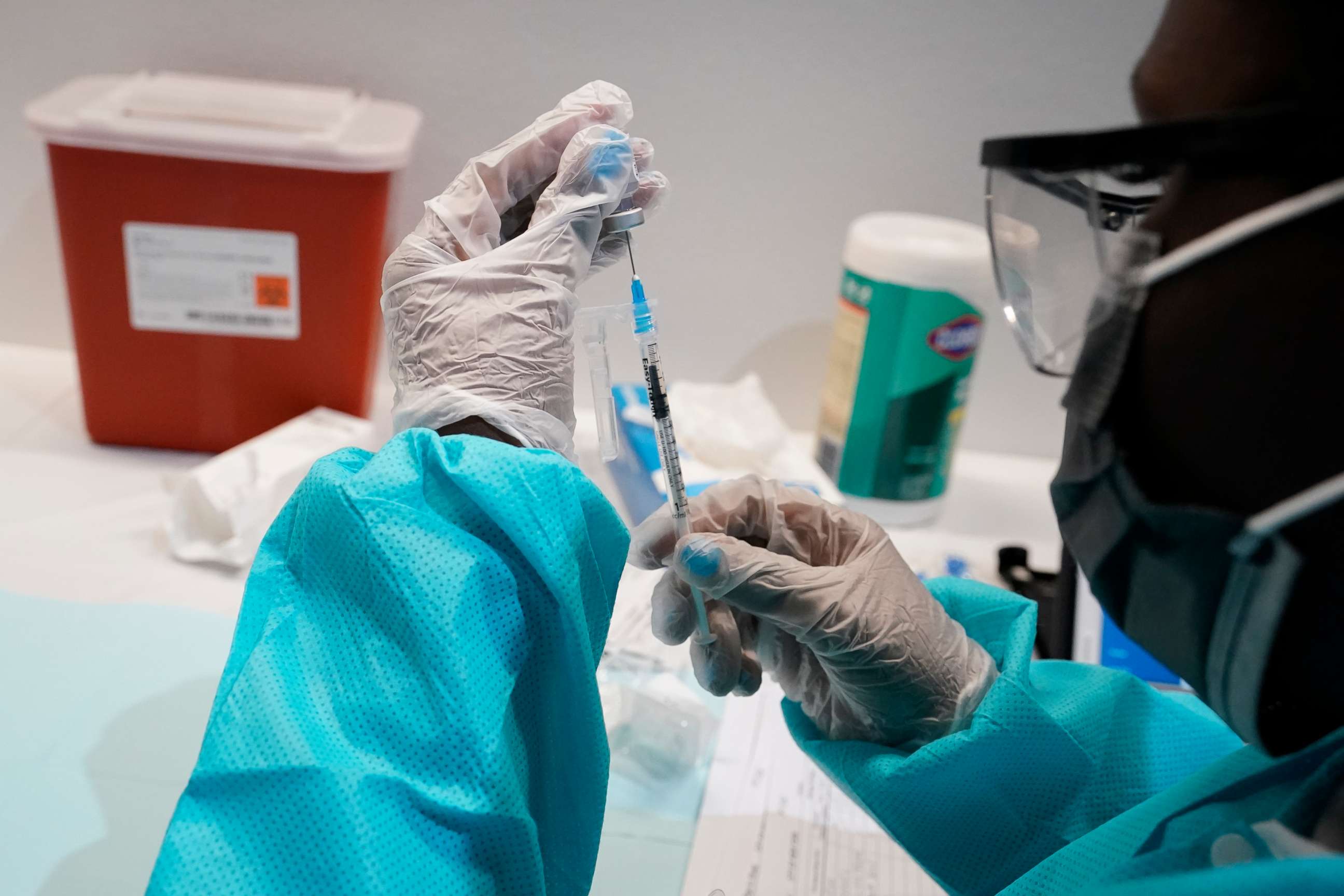 PHOTO: A health care worker fills a syringe with the Pfizer COVID-19 vaccine in New York, July 22, 2021.
