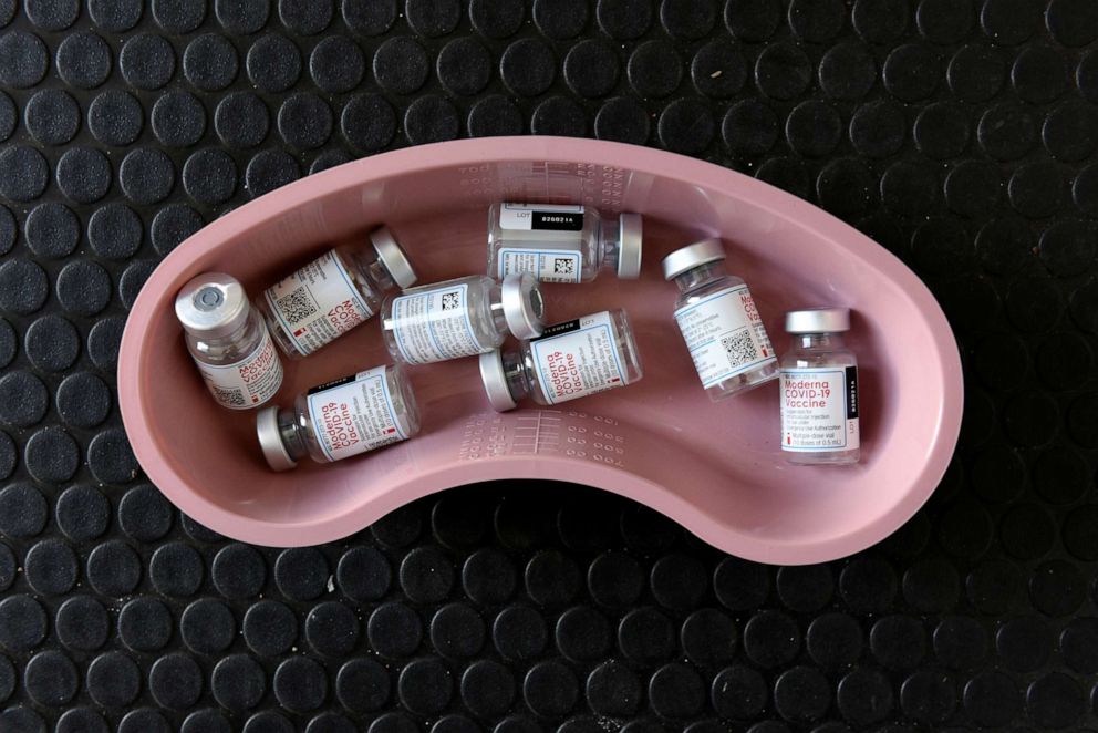 PHOTO: Empty vials of Moderna COVID-19 vaccine are pictured in a kidney dish at a rest stop near Drayton, N.D., April 21, 2021.
