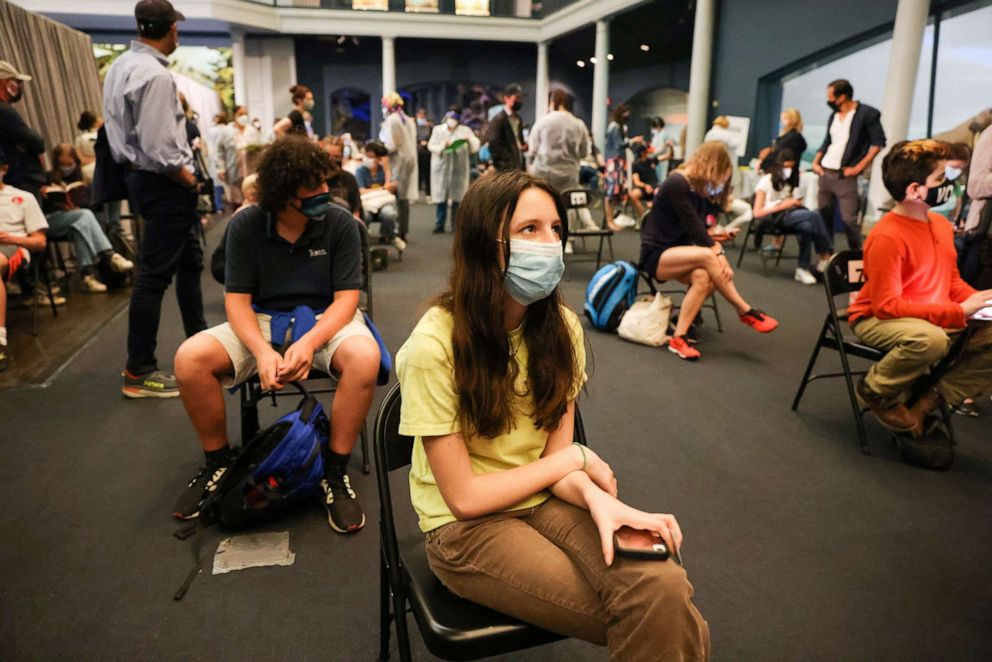 PHOTO: Jane Hassebroek waits after receiving the COVID-19 vaccine at the American Museum of Natural History in New York City, May 14, 2021.