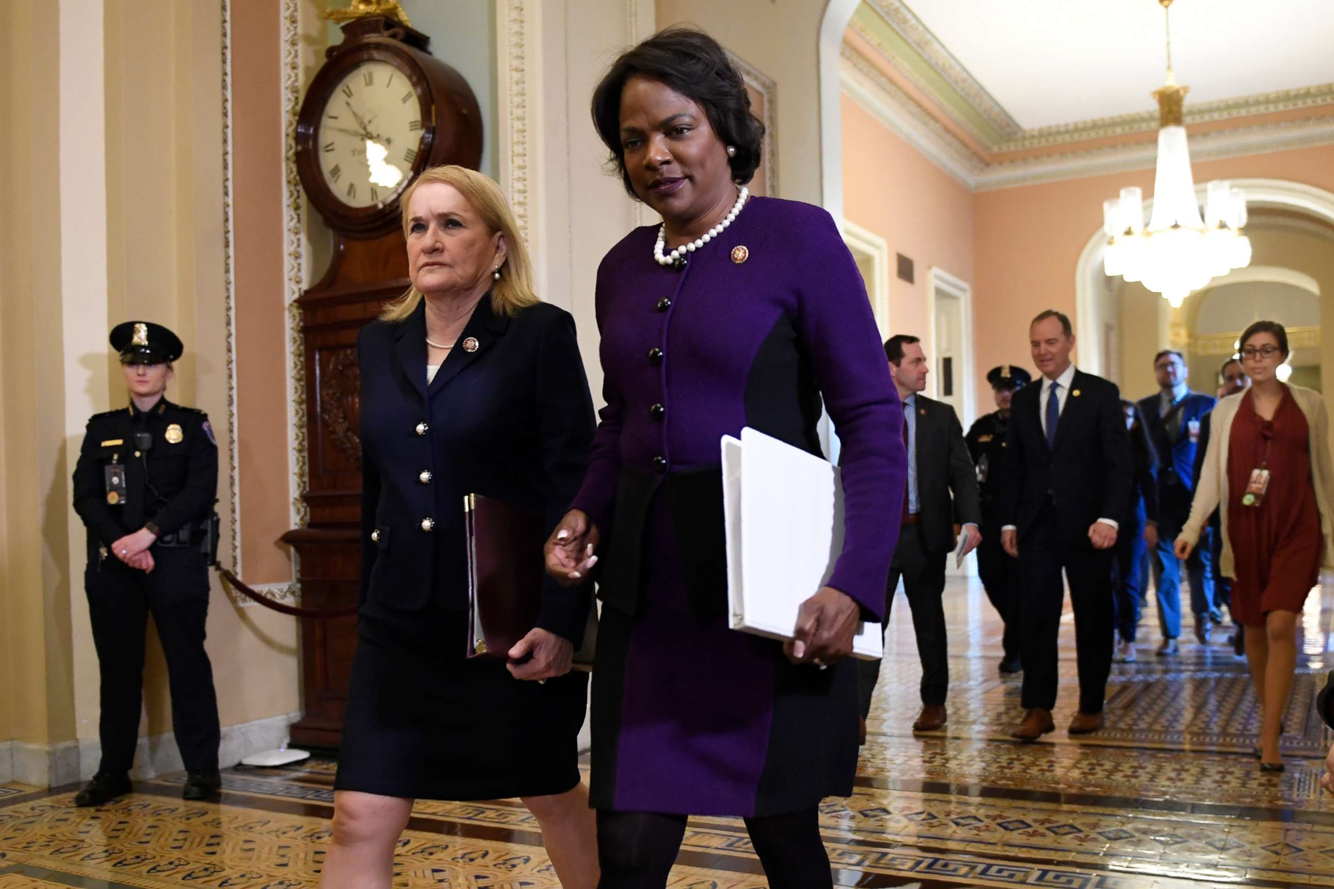 PHOTO: House Democratic impeachment managers Rep. Sylvia Garcia, second from left, and Rep. Val Demmings, third from left, arrive on the Senate side of Capitol Hill in Washington, Feb. 3, 2020, for the impeachment trial of President Donald Trump.