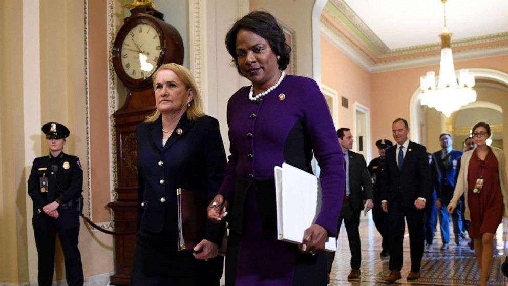 PHOTO: House Democratic impeachment managers Rep. Sylvia Garcia, second from left, and Rep. Val Demmings, third from left, arrive on the Senate side of Capitol Hill in Washington, Feb. 3, 2020, for the impeachment trial of President Donald Trump.