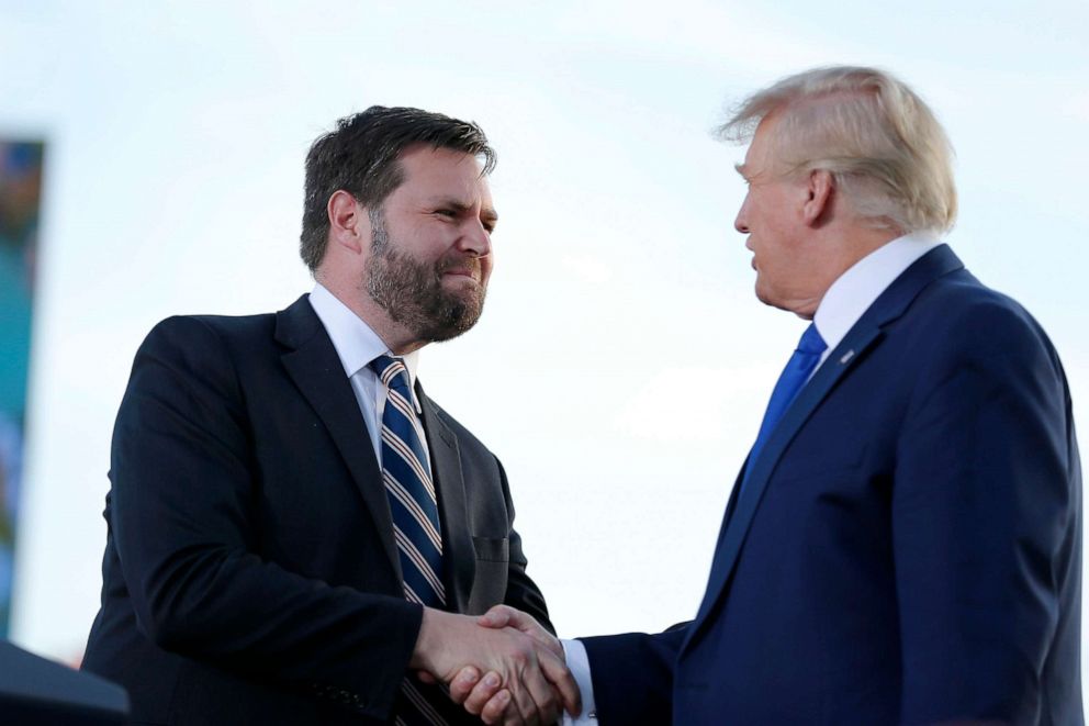 PHOTO: Senate candidate JD Vance, left, greets former President Donald Trump at a rally at the Delaware County Fairground, April 23, 2022, in Delaware, Ohio.