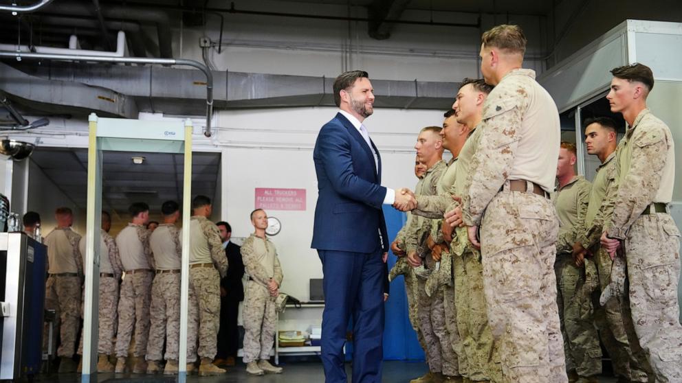 PHOTO: Vice President JD Vance shakes hands with troops at the Wilshire Federal Building on June 20, 2025, in Los Angeles.